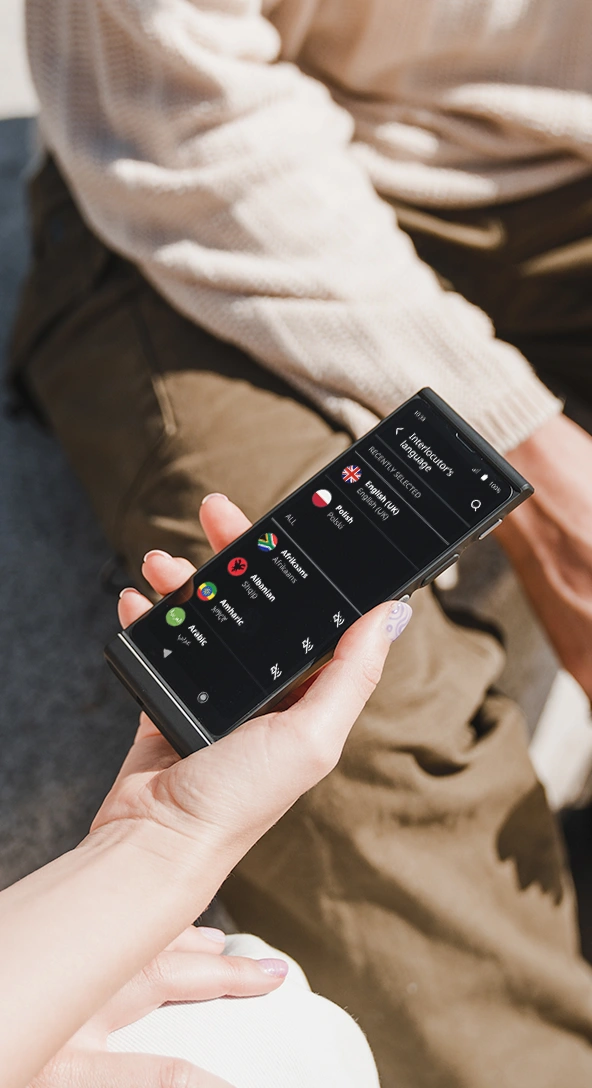 A Vasco Translator V4 showing the language selection screen with multiple languages available.